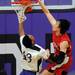 Pioneer High School senior Tevis Robinson attempts to block a dunk by Bedford High School Jackson Lamb during the first quarter at Pioneer on Tuesday, Feb. 19, 2013. Melanie Maxwell I AnnArbor.com